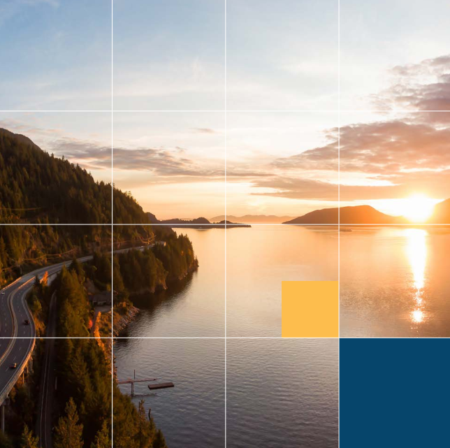 Aerial panoramic of highway during a colorful sunset in fall