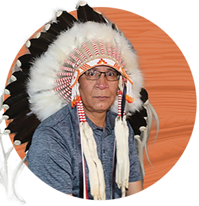 IAC member, Chief Matthew Peigan on orange circular background